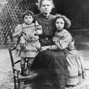 PHOTO: EAST NEWS/AFP 
(FILES) Picture dated 1908 shows Marie Curie posing with her two daughters Eve (l) and Irene in their home's garden.  Marie Curie and her husband, the French physicist, Pierre Curie, were the discoverers of radium and won the Nobel prize for physics in 1903. Pierre Curie was born in Paris 15 May 1859 and his most important contributions to physics was the discovery that the magnetic properties of substances change at certain temperature, known as the "Curie point." He became known for his work on radioactivity carried out jointly with his wife Marja (Marie) Sklodowska (born in Warsaw 07 November 1867) whom he married in 1895. On 18 July 1898, they announced the discovery of two new elements in the mineral uranium, polonium and radium. The work of the Curie couple laid the foundation for much of the later research in nuclear physics and chemistry. Marie Curie was the first person to receive two Nobel prizes when she was awarded the Nobel prize for chemistry in 1911.